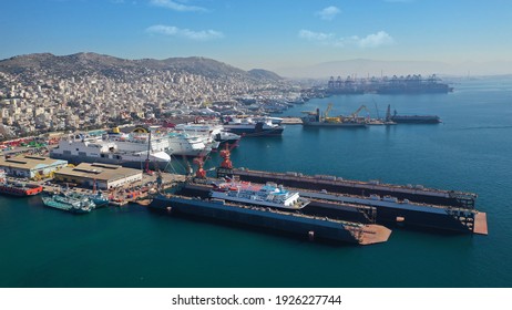 Aerial Drone Photo Of Small Port Next To Shipyard And Ship Repair Area Of Perama Next To Island Of Salamina, Attica, Greece