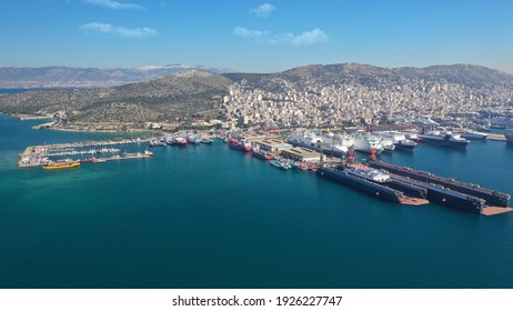 Aerial Drone Photo Of Small Port Next To Shipyard And Ship Repair Area Of Perama Next To Island Of Salamina, Attica, Greece