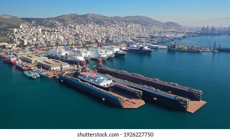 Aerial Drone Photo Of Small Port Next To Shipyard And Ship Repair Area Of Perama Next To Island Of Salamina, Attica, Greece