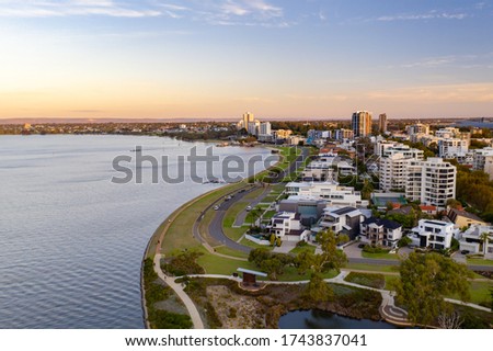An aerial drone photo of the South Perth Foreshore at sunset. 