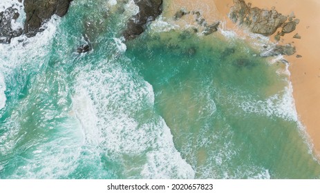 Aerial drone photo waves breaking to rock cliff.Beautiful  waves crashing on the rocks Coast islands.Top view beach on season background.Amazing landscape waves nature splashes rocky on summer,no body - Powered by Shutterstock
