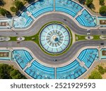 Aerial Drone point of view of Unirii Water Fountains. Situated in the city center of Bucharest is one of the main attraction. Light show every weekend, in summer.