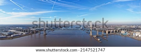 Aerial drone. Queen Elizabeth II suspension bridge. Dartford crossing on the River Thames, between Kent and Essex in South East England.
