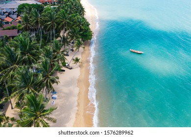 Aerial Drone Scenery Of Picturesque Coastline With Turquoise Water Waves And Tropical Palms. Bird's Eye View Of Paradise Beach With Boat Near Shoreline Of Hawaii, Destination For Summer Vacations 