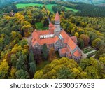 Aerial drone Shot of Abbey in Clervaux, Luxembourg in mystery evening twilight 