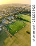 Aerial drone shot of a football pitch in the middle of a park in Bishops Stortford