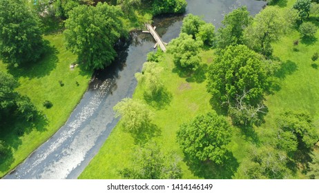 Aerial drone shot over a park in Valley Stream, New York showing the beautiful green landscape from a bird's eye point of view