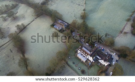 Aerial drone shot of peak district on misty morning