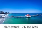 Aerial Drone shot of Pier 60 Clearwater Beach Florida on the Gulf of Mexico. Vacation Destination. Voted one of the best beaches in Florida!