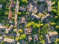 Aerial Drone Shot Of Residential Property , Houses And Gardens In The Village Of Pool In Wharfedale, West Yorkshire