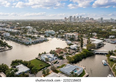 Aerial drone shot of sunrise key neighborhood in Fort Lauderdale, you can see the Rio Barcelona canal, modern and luxury houses, blue sky boats and tropical climate - Shutterstock ID 2232118603