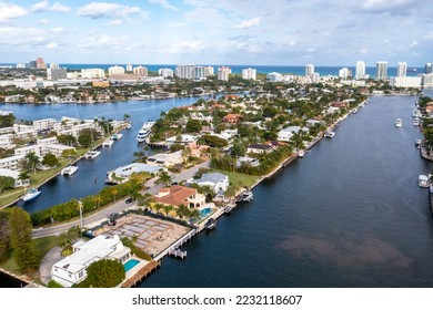 Aerial drone shot of sunrise key neighborhood in Fort Lauderdale, you can see the Rio Barcelona canal, modern and luxury houses, blue sky boats and tropical climate - Shutterstock ID 2232118607