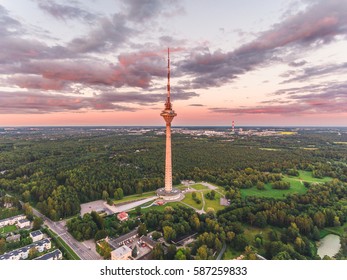 Aerial Drone Shot Of The Tallinn TV Tower At Summer Evening At Sunset. 