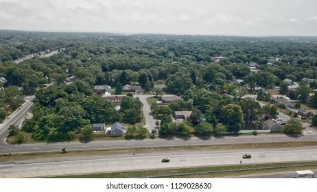 Aerial Drone Shutting Photo Sunrise Parkway And Houses In Patchogue. New York