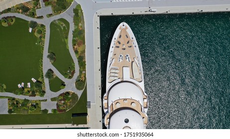 Aerial Drone Top Down Photo Of Luxury Yacht Anchored In Mediterranean Bay Marina