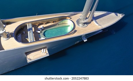 Aerial drone top down photo of "A" Super Yacht, World's Largest Sailing Yacht designed by Philippe Starck, belonging to the Russian tycoon Andrey Melnichenko in deep blue Aegean sea - Shutterstock ID 2052247883