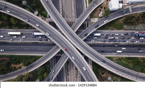 Aerial drone top view photo of highway multilevel junction interchange road in urban populated area - Shutterstock ID 1429134884