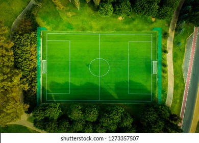 aerial drone top view of playing football court daytime