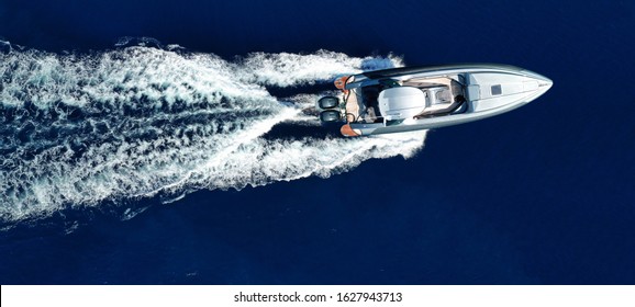 Aerial Drone Top View Ultra Wide Photo Of Luxury Inflatable Rib Speed Boat Cruising In Mediterranean Deep Blue Sea