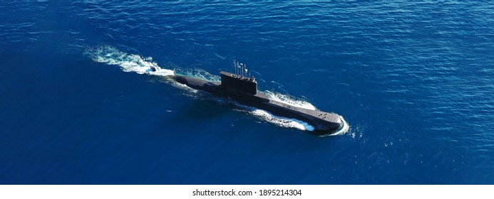 Aerial drone ultra wide panoramic photo of latest technology navy armed diesel powered submarine cruising half submerged in deep blue sea