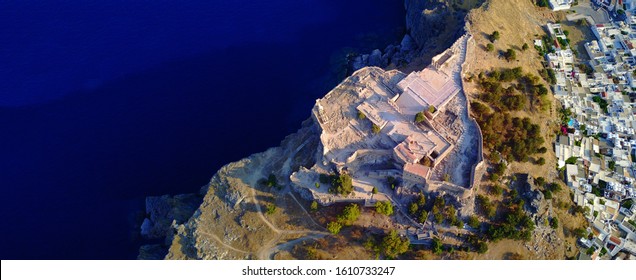 Aerial Drone Ultra Wide Photo Of Famous Castle And Village Of Lindos, Rodos Island, Dodecanese, Greece