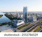 Aerial drone video of the MOL Campus a neomodern skyscraper and the headquarters of MOL Group in Budapest Hungary during golden hour sunset