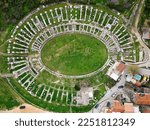 Aerial drone view of the Amphitheatre of Salona at Solin, Croatia.  Roman ruins. Places of historic interest. Travel and discover history and culture. Ruins and archaeological site. 
