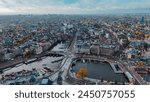 Aerial drone view Amsterdam autumn cityscape narrow old houses, canals, boats bird