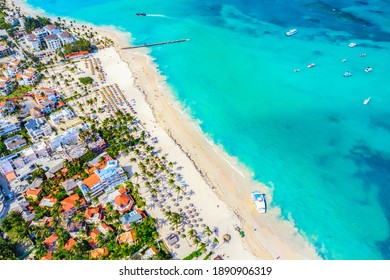 Aerial Drone View Of Beautiful Caribbean Tropical Beach With Palms And Boats. Bavaro, Punta Cana, Dominican Republic. Vacation Background