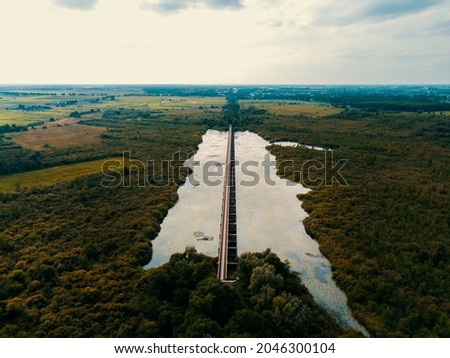 Aerial drone view of the beautiful historical Moerputten railroad bridge in the Netherlands.