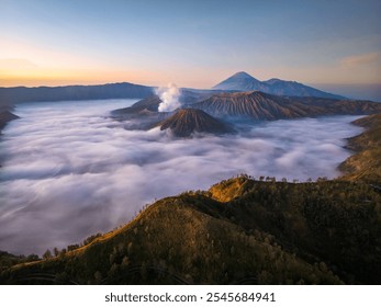 Aerial drone view of Bromo active volcano with Kingkong hill viewpoint, Tengger Semeru national park, East Java, Indonesia - Powered by Shutterstock