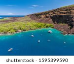 Aerial drone view the Captain James Cook Monument in Kealakekua Bay, Big Island, Hawaii. The monument marks the spot where James Cook was killed in a fight with native Hawaiians in 1779.