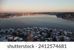 An aerial drone view of the eastside of Lake Stevens at sunset in winter
