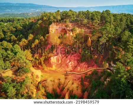 Aerial drone view of famous Ochre path (Sentier des Ocres in French) through large ochre deposits in Roussillon, Provence, France