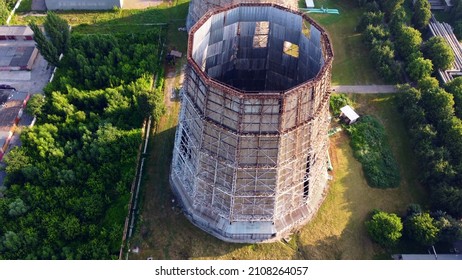 Aerial drone view flight near thermal power plant. Cooling towers of CHP thermoelectric power station. View of the power plant and cooling towers. Cooling towers of a thermoelectric power station