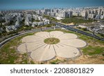 Aerial drone view of the flower highway interchange with Israeli flags- Rishon Lezion