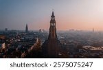 Aerial drone view of Groningen, Netherlands, showcasing historic architecture, modern buildings, and scenic canals. Perfect for urban, travel, and landscape stock themes.