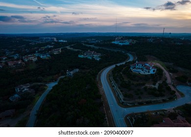 Aerial Drone View High Above Residntial Luxury Suburb Austin Texas Sunset Over West Lake