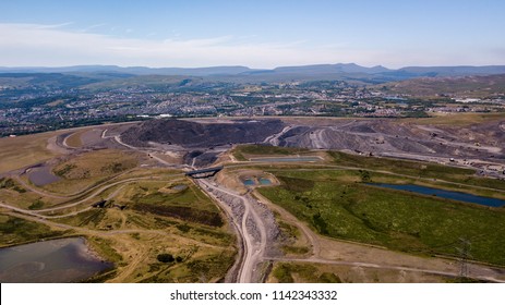 Aerial Drone View Of A Large, Buried Landfill Dump Site In Wales