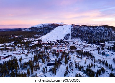 Aerial drone view of the Levi ski village, winter evening sunset, in Lapland