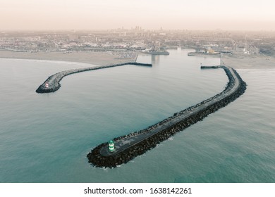 Aerial drone view of lighthouses and the harbour of Scheveningen, The Hague, Netherlands