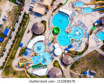 Aerial Drone View Looking Straight Down From Above Colorful Summer Time Fun At Water Park. Top View