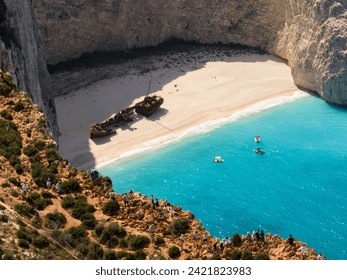 Aerial drone view of Navagio beach on Zakynthos island, Greece. Shipwreck on the beach in Zakynthos island, Greece. Shipwreck Beach or Agios Georgios. is exposed cove in the Ionian Islands of Greece. - Powered by Shutterstock