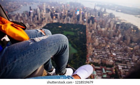 Aerial Drone View  Of New York City. Couple Taking A Tour On The Helicopter