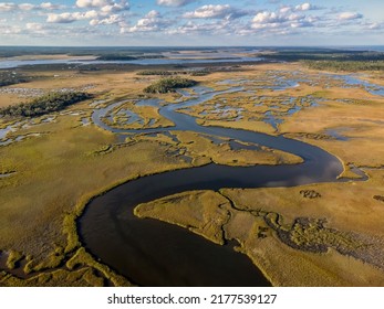 Aerial Drone View of Northeast Florida Wetlands in the Guana River Wildlife Management area with snaking river waterway. A natural habitat for fish, birds, insects and a  variety of aquatic species