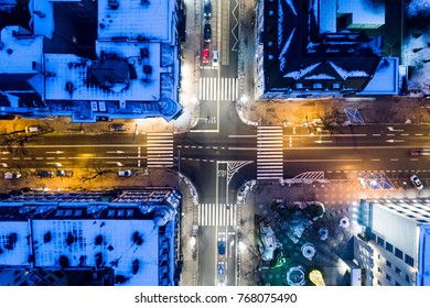 Aerial drone view on city intersection during winter night in Gliwice, Silesia, Poland