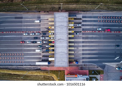 Aerial drone view on toll collection point on the motorway - Shutterstock ID 1016501116