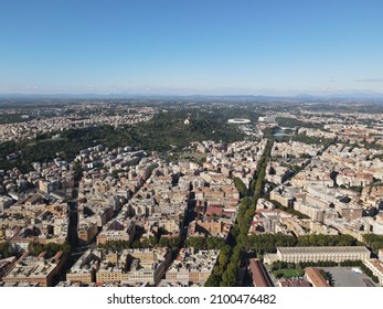 Aerial drone view of Rome from Monte Mario, buildings of Rome and Stadio Olimpico in the background. Birds eye of Rome from above, ancient city known for Saint Peter's Basilica and Coliseum, in Italy.