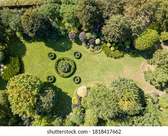 Aerial Drone View. Round Flower Bed On The Lawn.