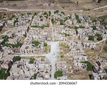 Aerial Drone View Of The Ruins Of Poggioreale On The Belice Valley, In The Province Of Trapani. The Town Was Destroyed By And Earthquake In 1968. Abandoned Empty Eerie Ghost Town In Sicily.